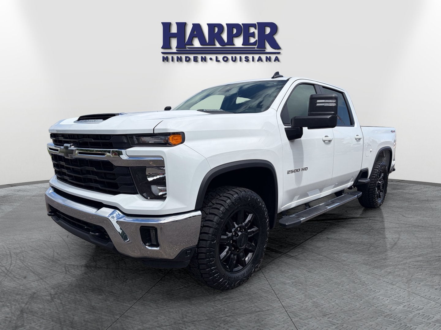 2025 Chevrolet Silverado 2500 HD LT in Summit White — front three-quarter view