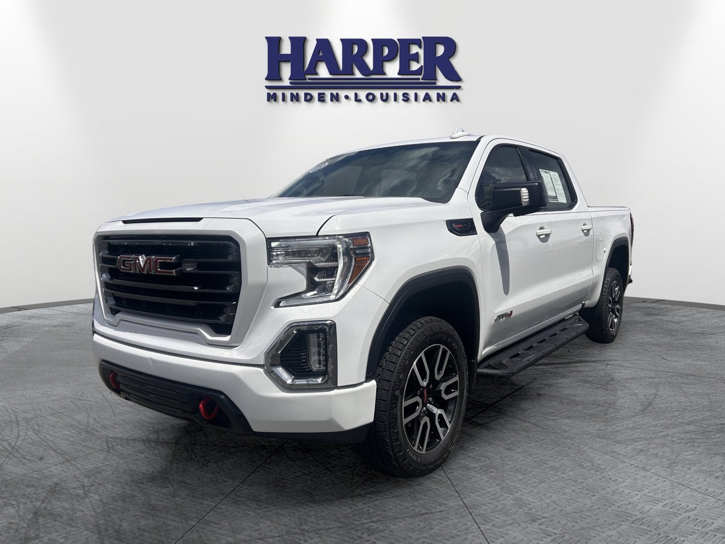 2021 GMC Sierra 1500 AT4 in Summit White — front three-quarter view