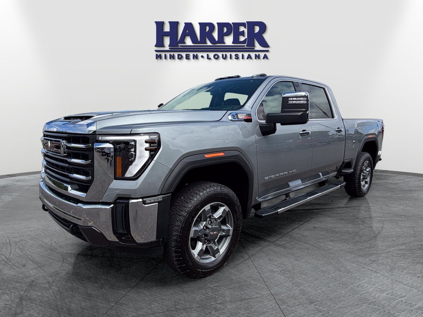 2026 GMC Sierra 2500 HD SLT in Sterling Metallic — front three-quarter view
