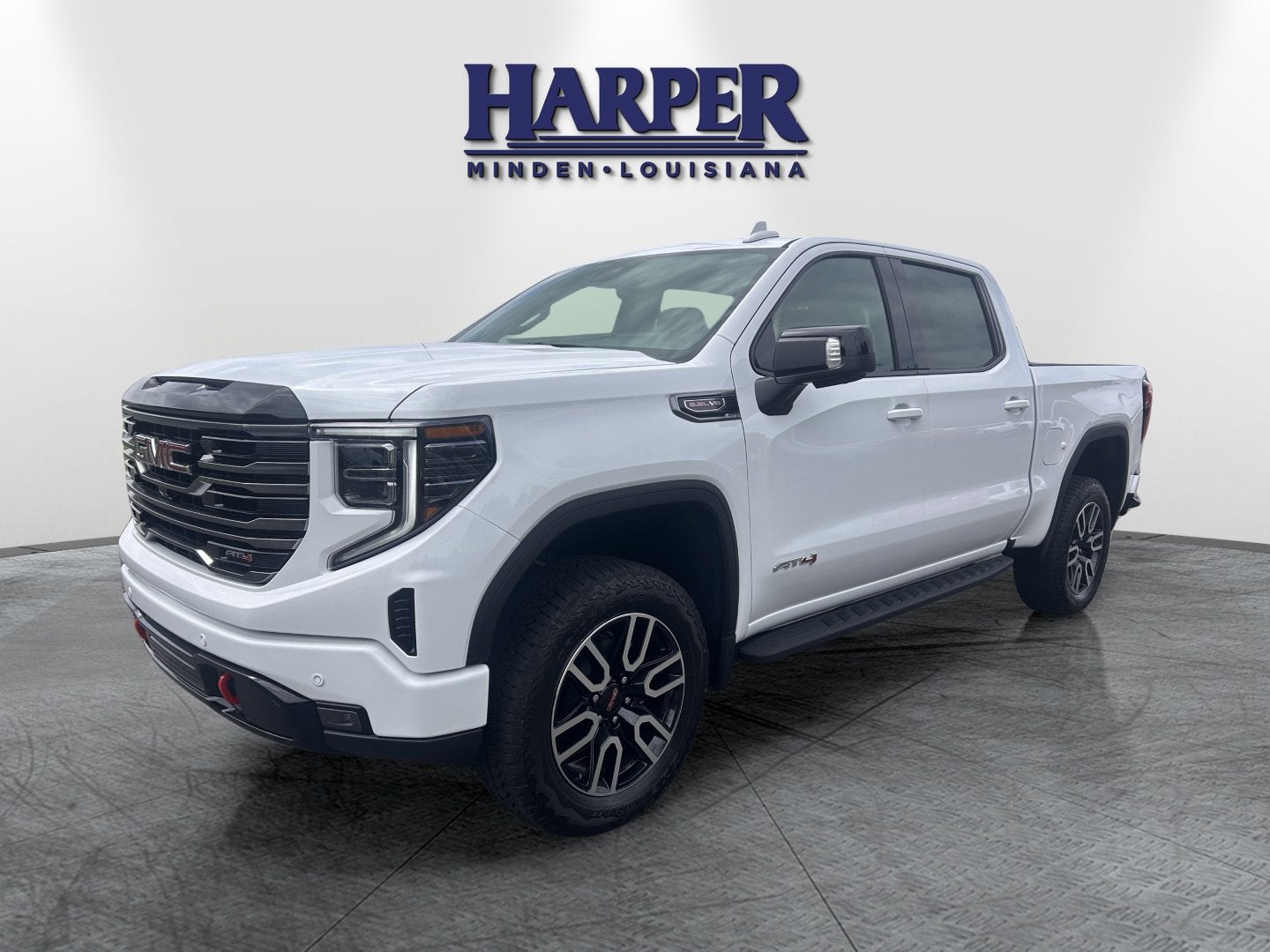2026 GMC Sierra 1500 AT4 in Summit White — front three-quarter view